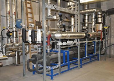 Waste heat recovery for refrigeration plant